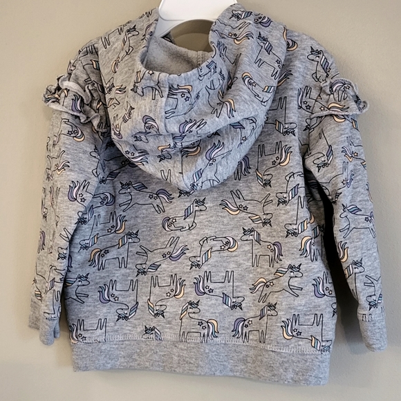 Grey zip up unicorn print hoodie with front ruffle. - Picture 2 of 4